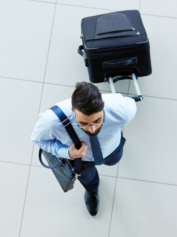 Man walking with suitcase